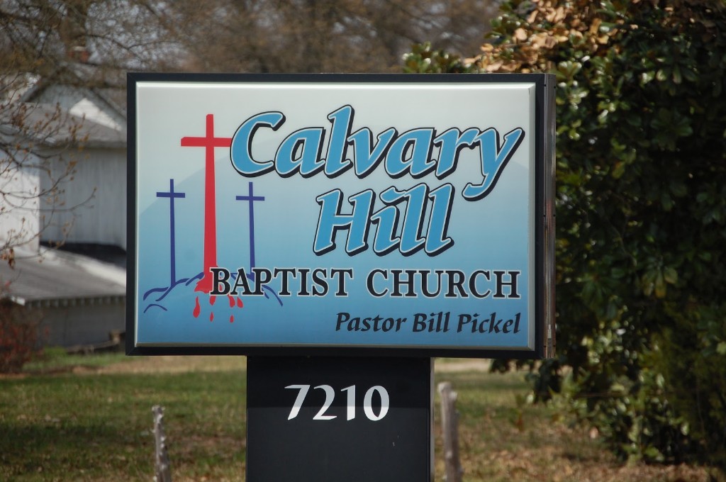 Roadside sign for Calvary Hill Baptist Church, Pastor Bill Pickel, at 7210
